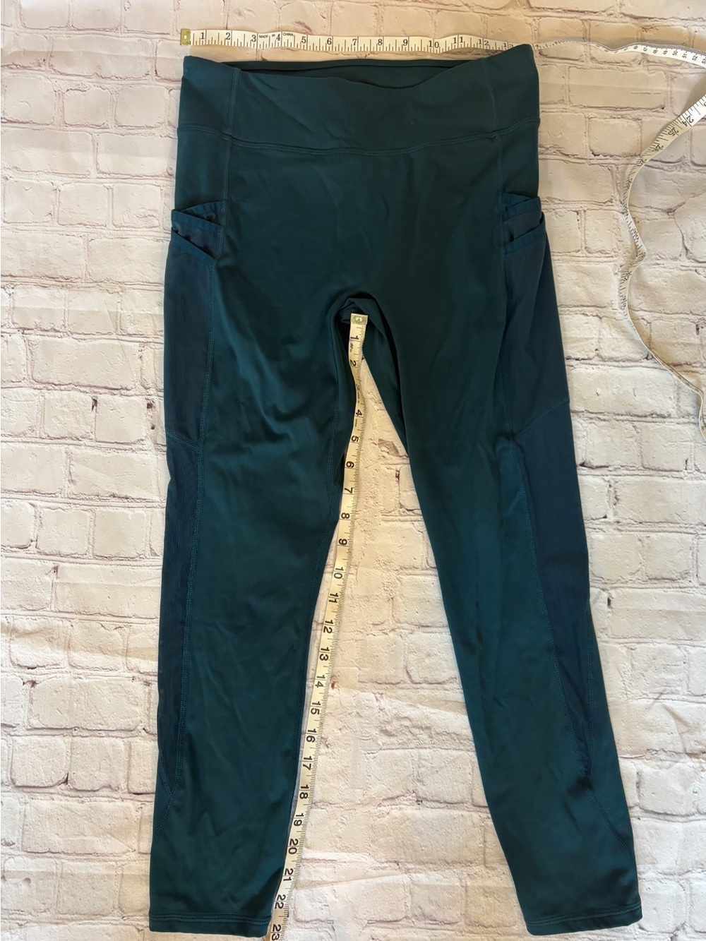 Fabletics Teal High-Waist Cropped Leggings with Side Pockets